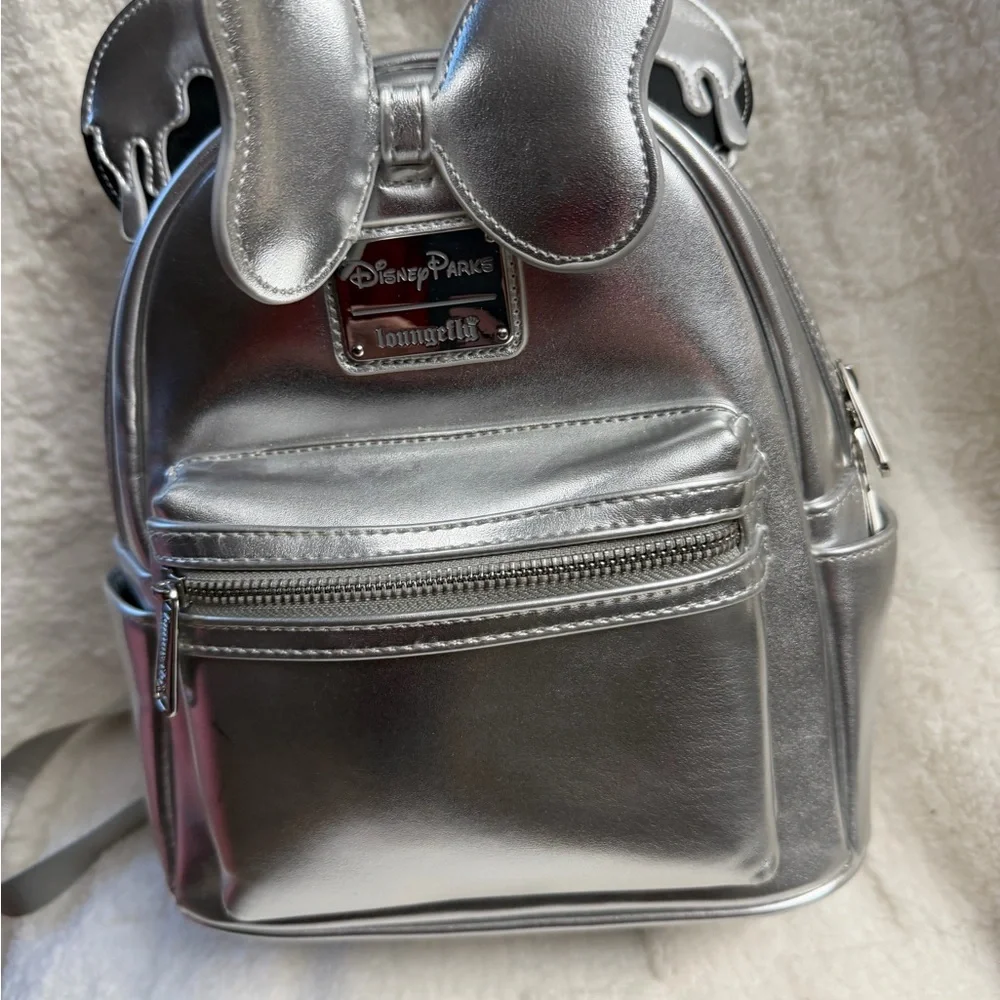 Loungefly Disney Parks Metallic Silver Backpack - Picture 1 of 4